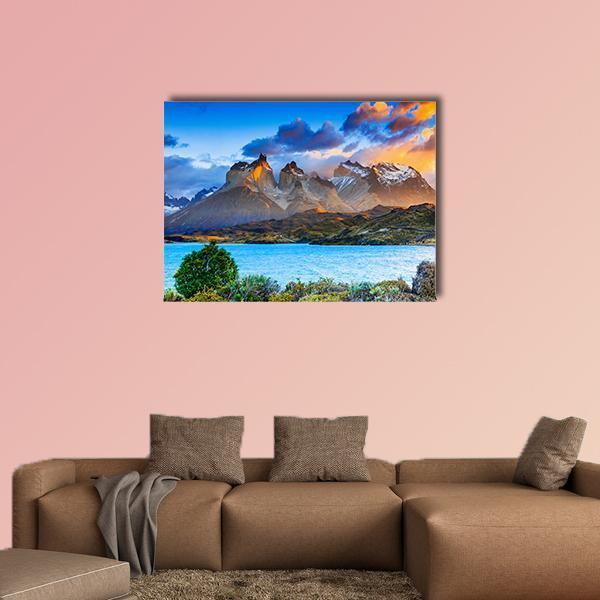 Sunrise Over Pehoe Lake Canvas Wall Art in brown, orange and blue, single panel hung on a wall