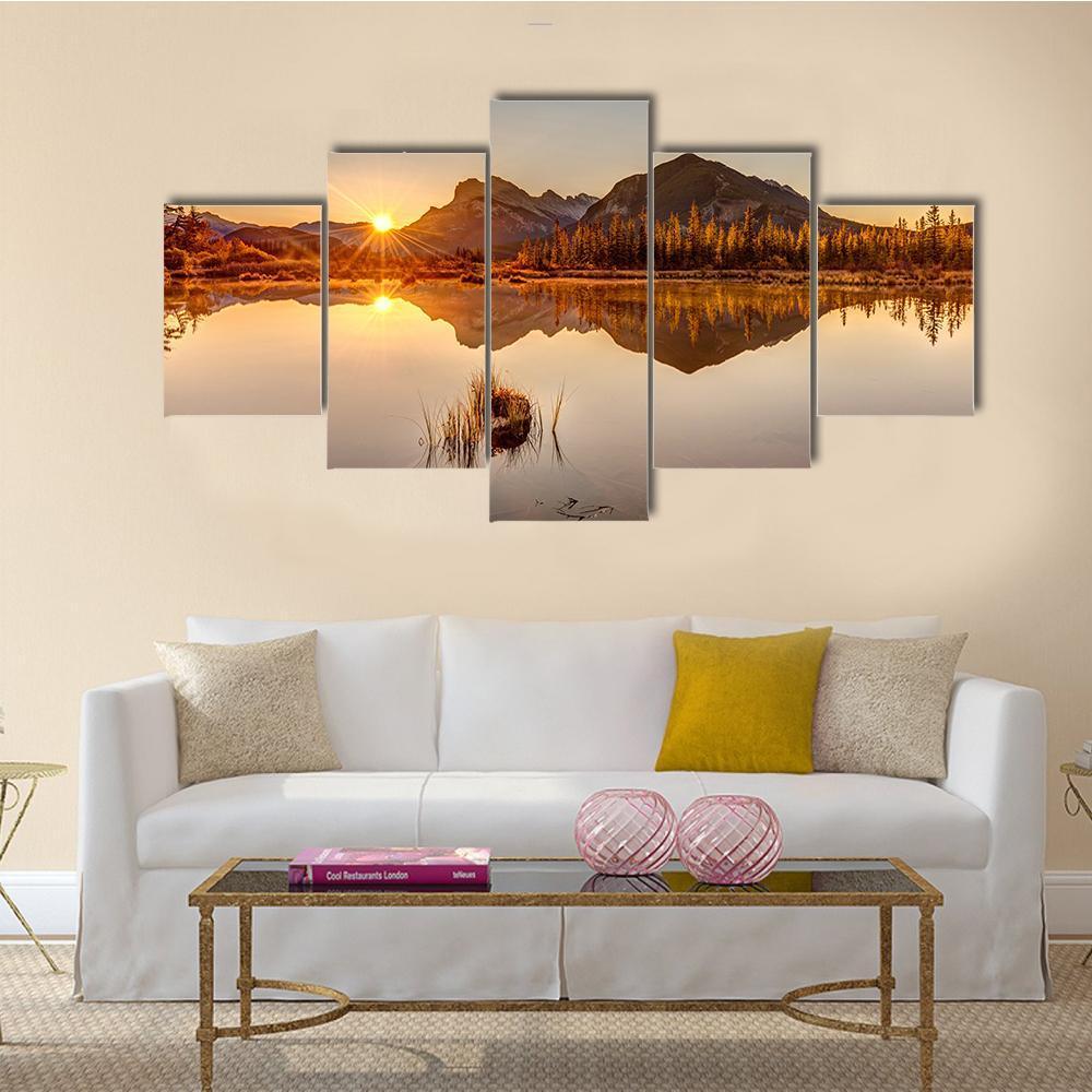 Sunrise Over Vermilion Lakes Canvas Wall Art in brown, orange and yellow, 5 panel Star layout hung on a wall