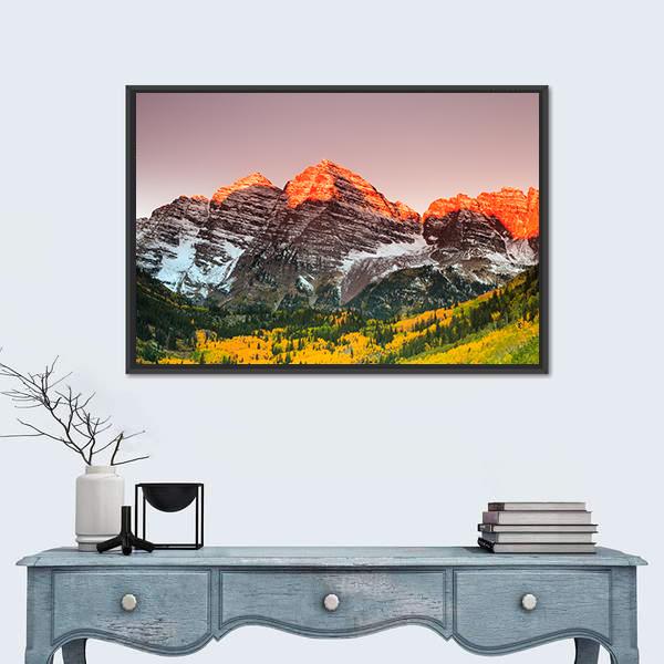 Sunrise Over Maroon Bells Canvas Wall Art in orange, yellow and pink, framed canvas, product view on a white background