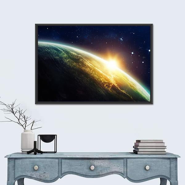 Sunrise on the Planet from Space Canvas Wall Art in black, yellow and blue, framed canvas, product view on a white background