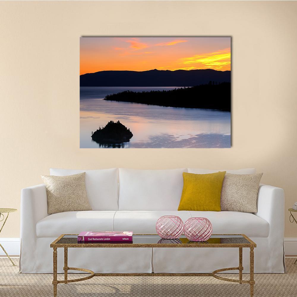 Sunrise Over Emerald Bay Canvas Wall Art in orange, yellow and blue, single panel hung on a wall