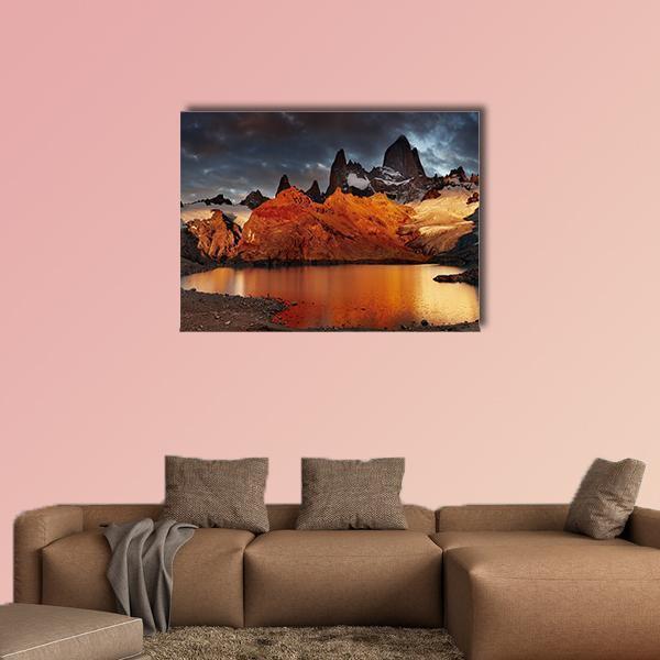 Sunrise at Laguna De Los Tres and Fitz Roy Canvas Wall Art in brown, orange and blue, single panel hung on a wall