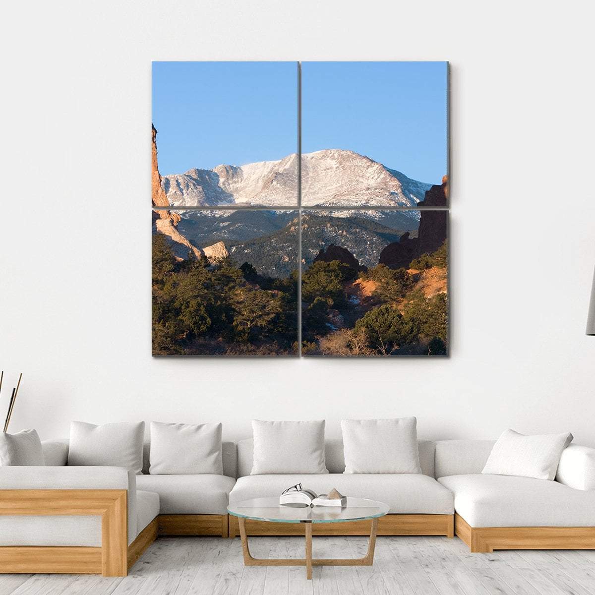 Sunrise Over Pikes Peak Canvas Wall Art in brown, orange and blue, hung on a wall