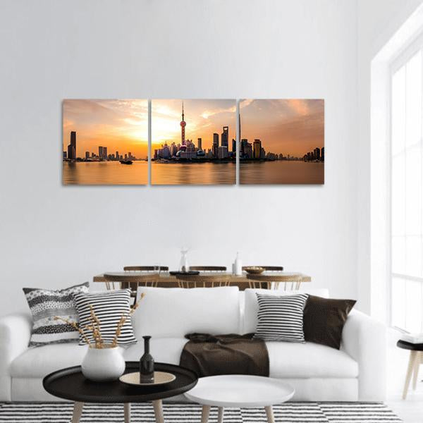 Shanghai Skyline at Sunset Panoramic Canvas Wall Art in brown, orange and yellow, hung on a wall