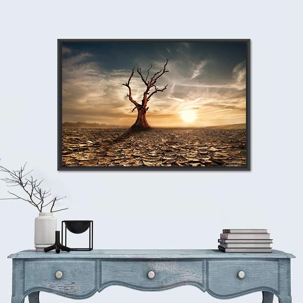 Sunset Over Drought-cracked Desert Canvas Wall Art in brown, orange and yellow, framed canvas, product view on a white background