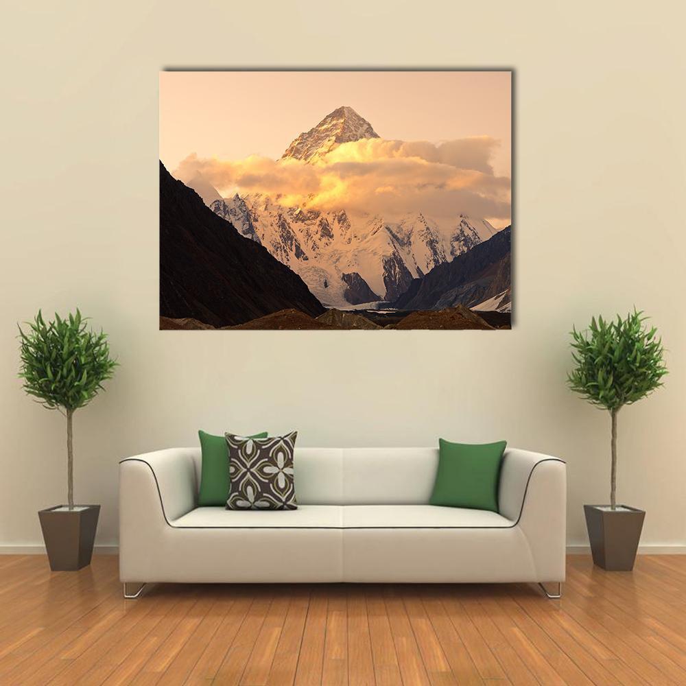 K2 at Sunset Canvas Wall Art in white, brown and orange, single panel hung on a wall