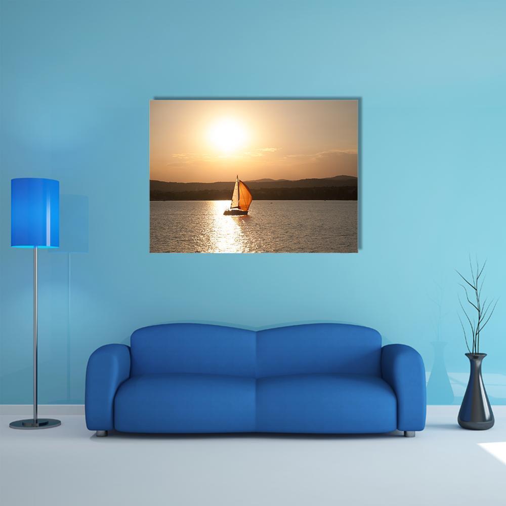 Sunset at Lake Balaton Canvas Wall Art in brown, orange and yellow, single panel hung on a wall