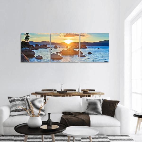 Sunset at Lake Tahoe Panoramic Canvas Wall Art in orange, yellow and blue, hung on a wall