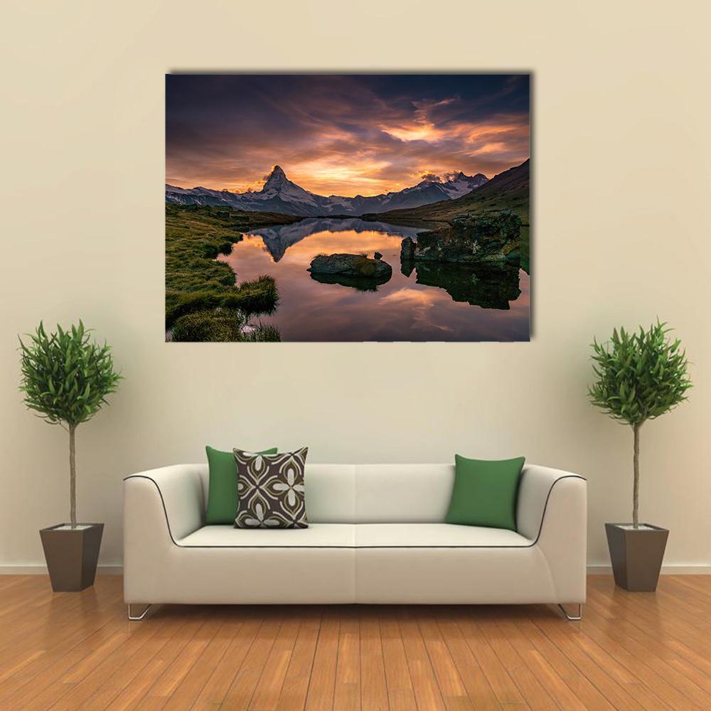 Sunset Reflection at Matterhorn and Stelli Lake Canvas Wall Art in brown, orange and purple, single panel hung on a wall