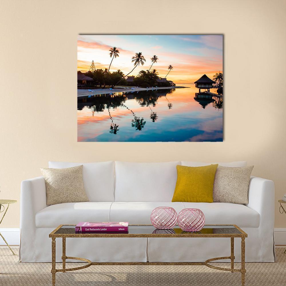 Tropical Sunset Reflection at Moorea Canvas Wall Art in orange, blue and pink, single panel hung on a wall