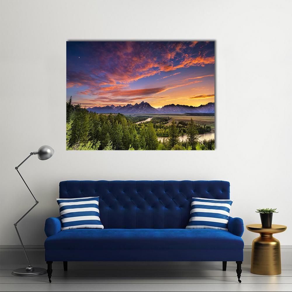 Sunset at Snake River Canvas Wall Art in orange, green and blue, single panel hung on a wall