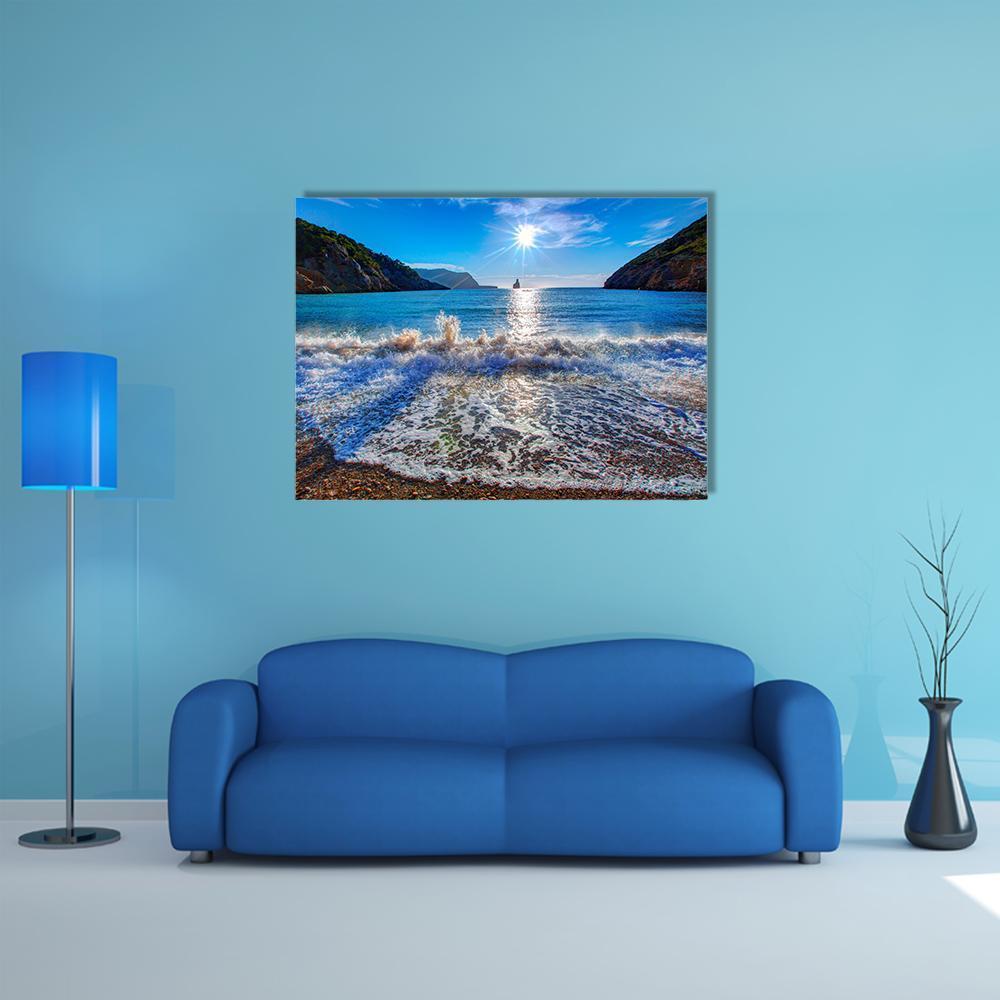 Sunset Beach with Boat on the Horizon Canvas Wall Art in white, orange and blue, single panel hung on a wall