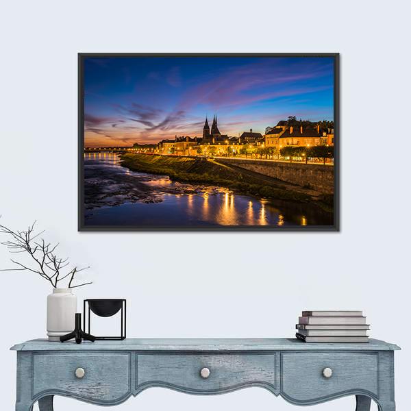 Sunset Cityscape with Cathedral and River Canvas Wall Art in orange, yellow and blue, framed canvas, product view on a white background