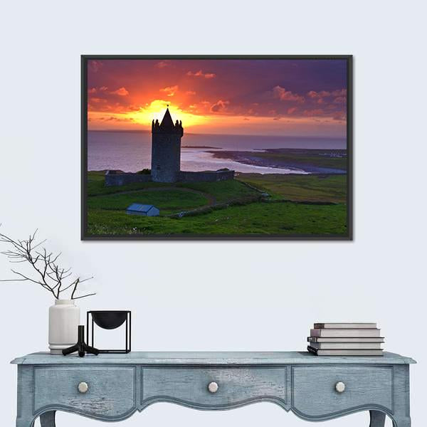 Coastal Castle at Sunset Canvas Wall Art in orange, green and purple, framed canvas, product view on a white background