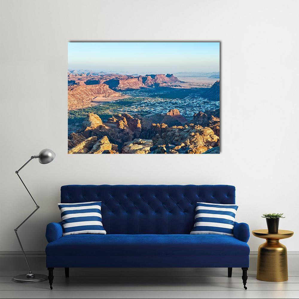 Madain Saleh Valley at Sunset Canvas Wall Art in brown, orange and blue, single panel hung on a wall