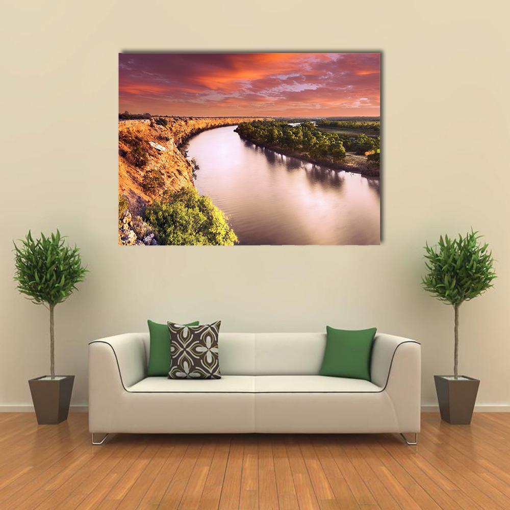Sunset on Murray River Canvas Wall Art in brown, orange and pink, single panel hung on a wall