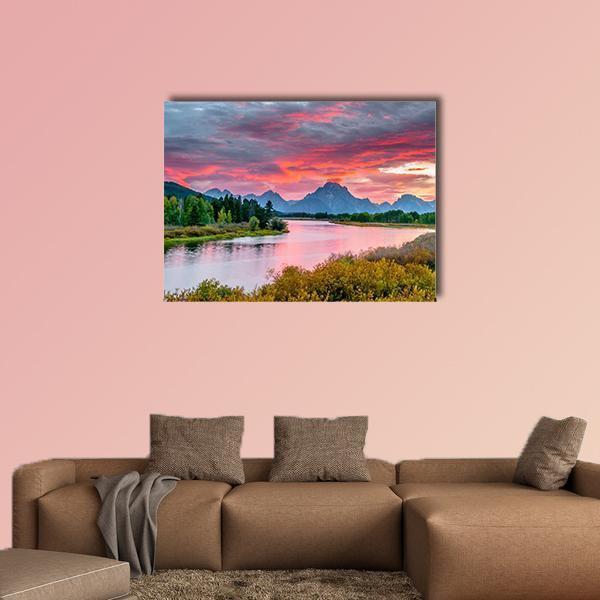 Sunset Over Grand Tetons Canvas Wall Art in orange, blue and pink, single panel hung on a wall
