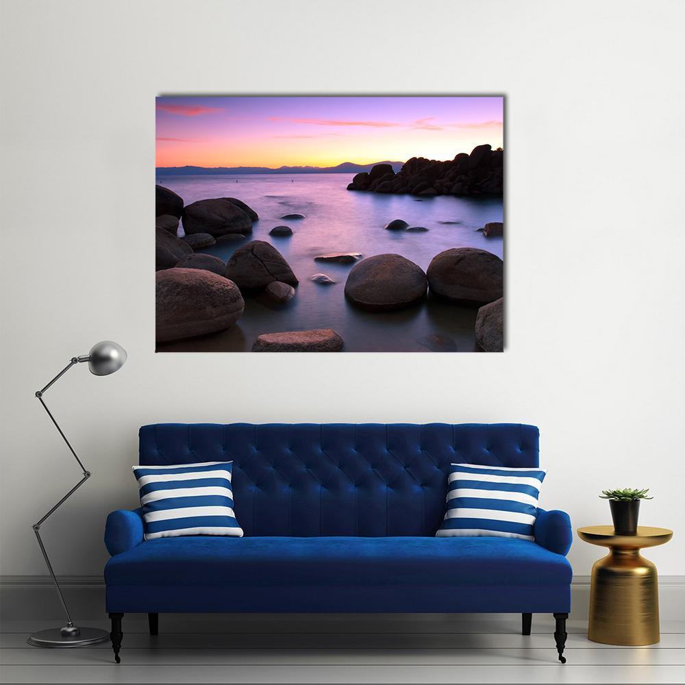Sunset Over Lake Tahoe Canvas Wall Art in orange, blue and purple, single panel hung on a wall