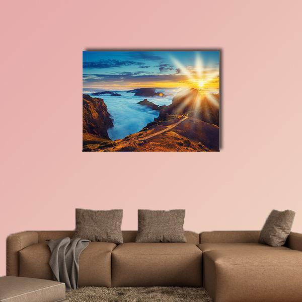 Sunset Over the Mountains in Portugal Canvas Wall Art in orange, yellow and blue, single panel hung on a wall