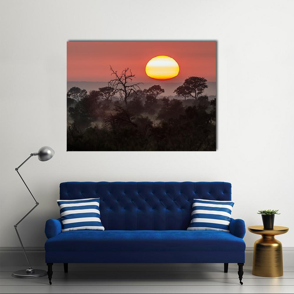 Kruger National Park Sunset Canvas Wall Art in black, orange and yellow, single panel hung on a wall