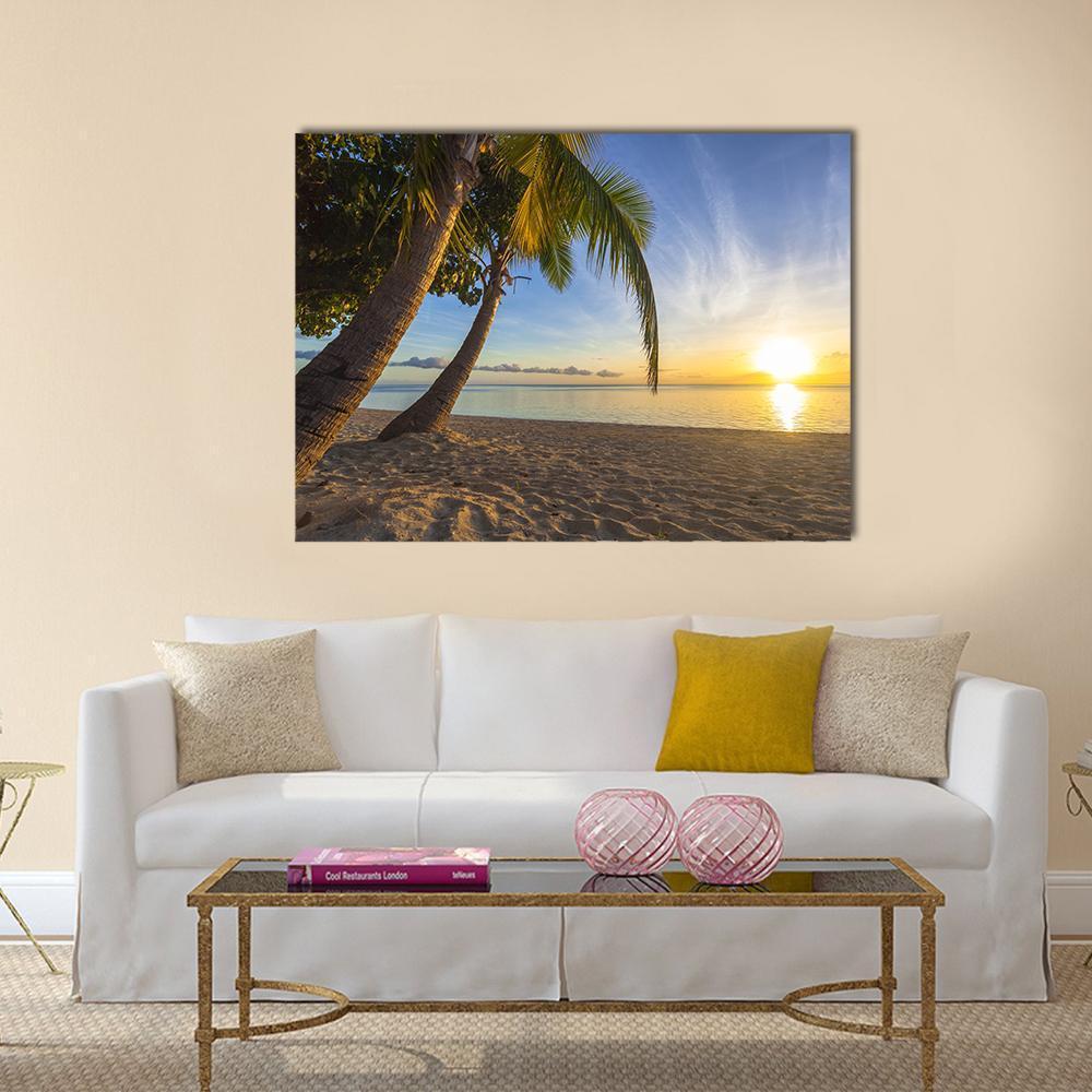 Sunset Over Tropical Fiji Beach Canvas Wall Art in orange, yellow and blue, single panel hung on a wall