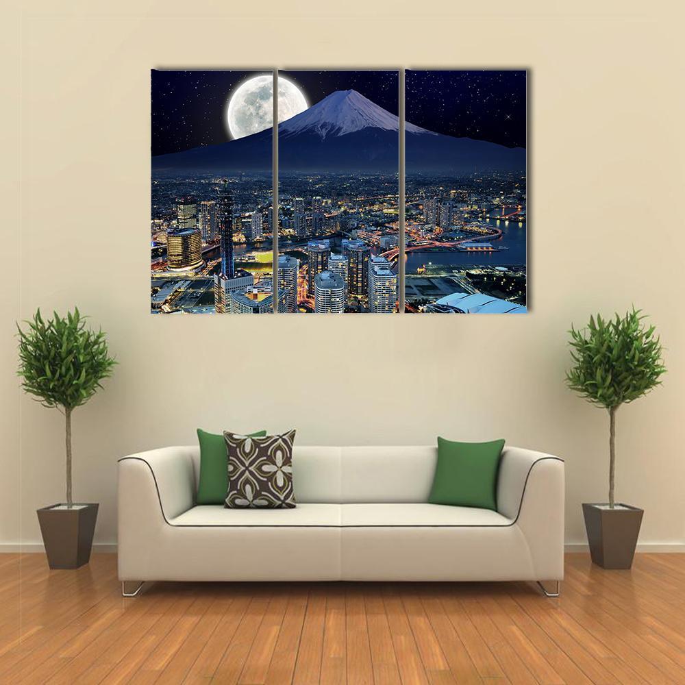 Moonlit Skyline of Yokohama Canvas Wall Art in black, blue and navy, 3 panel horizontal set hung on a wall