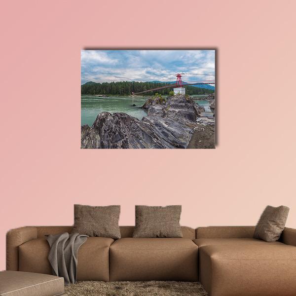 Red Suspension Bridge Over Mountain River Canvas Wall Art in gray, green and blue, single panel hung on a wall