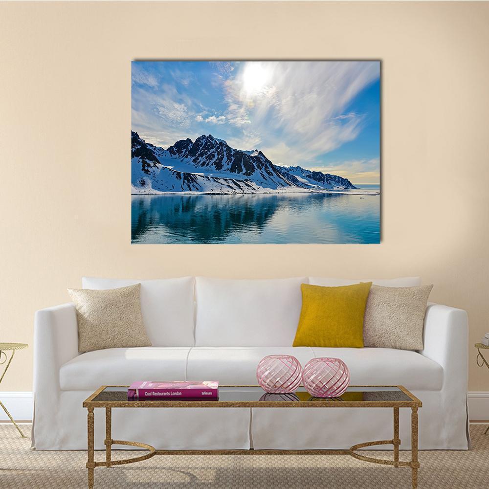 Svalbarden Fjords with Mountain Reflections Canvas Wall Art in white and blue, single panel hung on a wall