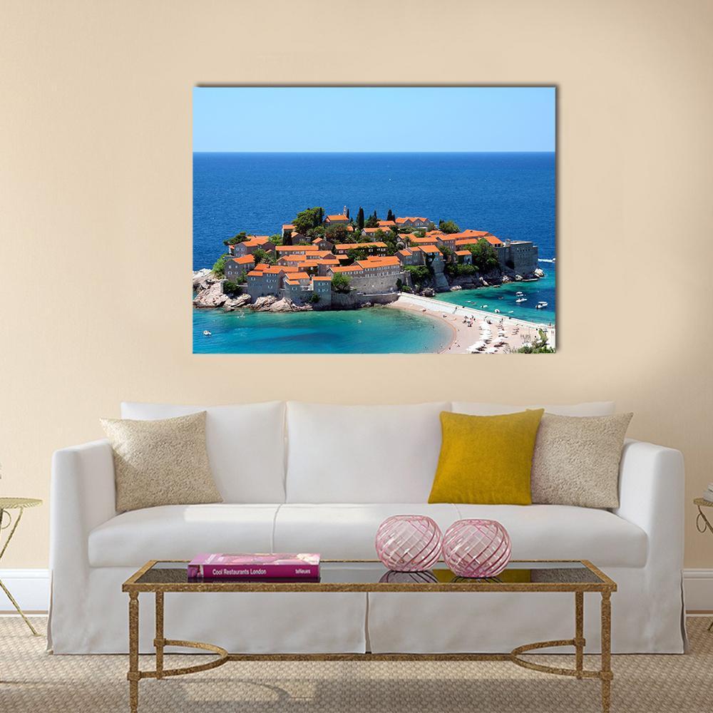 Sveti Stefan Island Village in Daylight Canvas Wall Art in brown, orange and blue, single panel hung on a wall