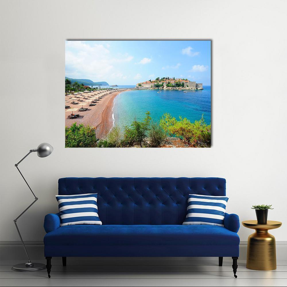 Sveti Stefan Island Aerial Beach View Canvas Wall Art in beige, green and blue, single panel hung on a wall