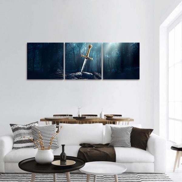 Sword in Stone with Golden Hilt Panoramic Canvas Wall Art in black, gold and blue, hung on a wall