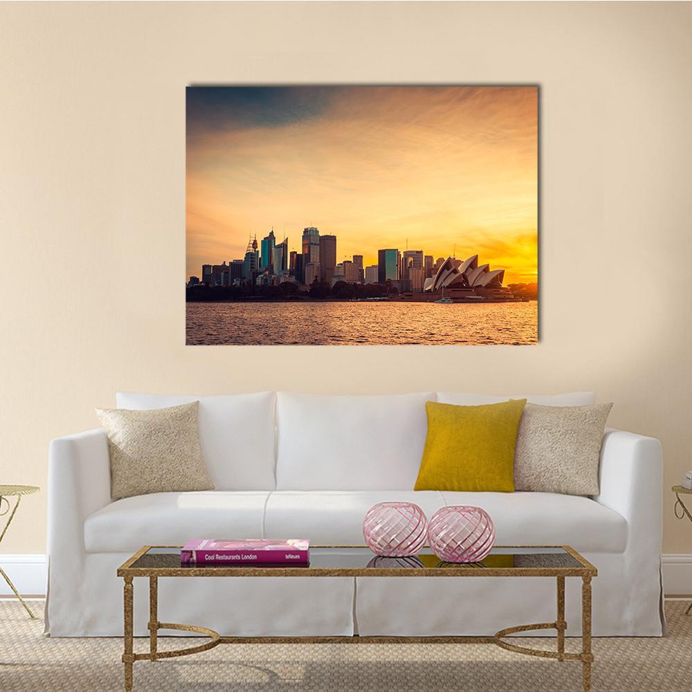 Sydney Opera House at Sunset Canvas Wall Art in orange, yellow and blue, single panel hung on a wall