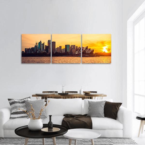 Sydney City View at Sunset Panoramic Canvas Wall Art in brown, orange and yellow, hung on a wall