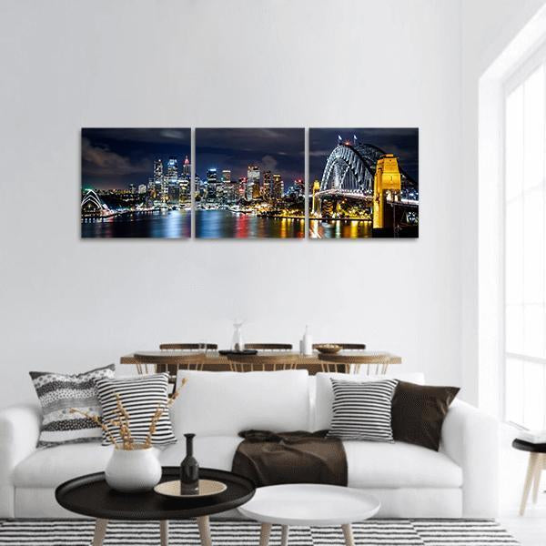 Sydney Harbour Bridge and Opera House Panoramic Canvas Wall Art in black, yellow and blue, hung on a wall