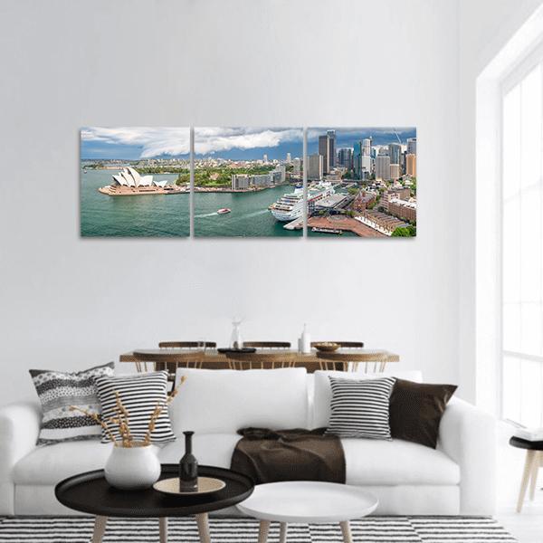 Sydney Harbour Opera House Aerial View Panoramic Canvas Wall Art in white, gray and blue, hung on a wall