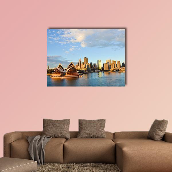 Sydney Opera House and Harbor Skyline Canvas Wall Art in white, gold and blue, single panel hung on a wall
