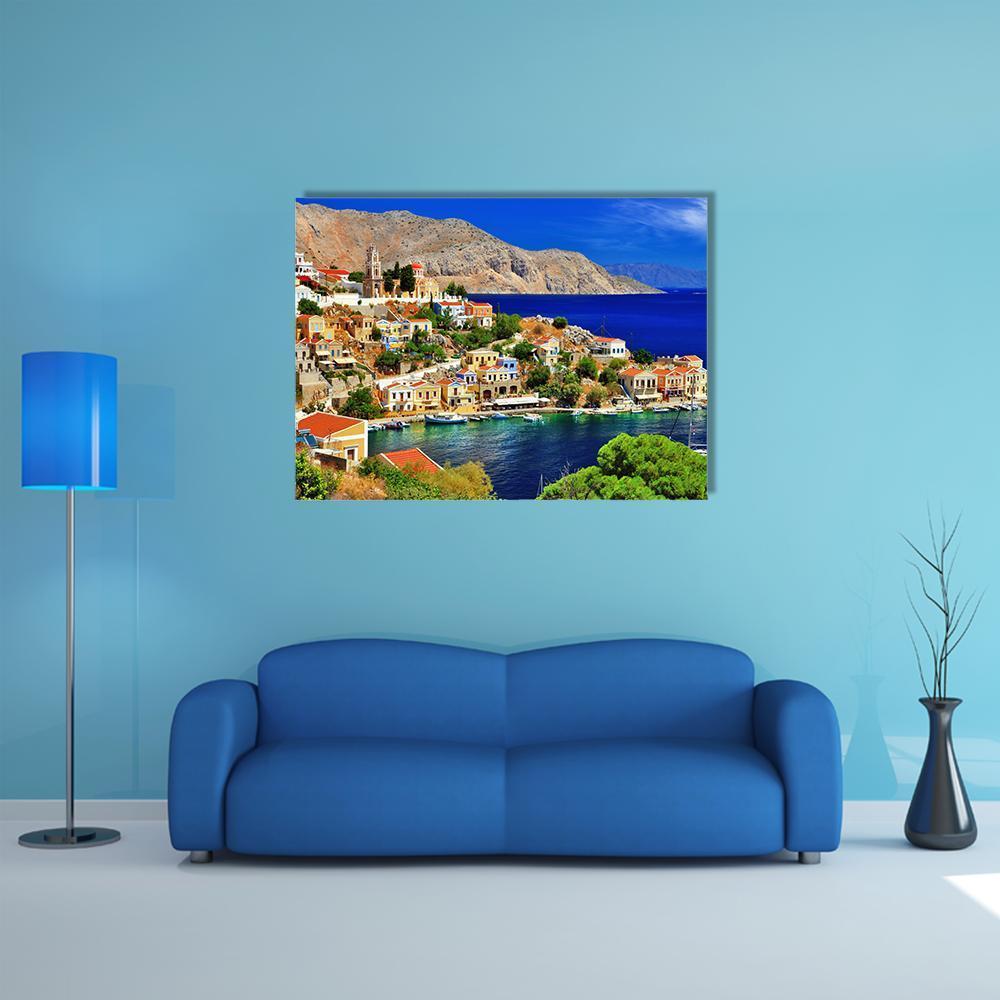 Symi Island Harbor, Greece Canvas Wall Art in beige, orange and blue, single panel hung on a wall