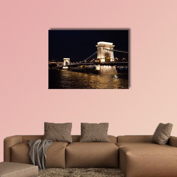 Szechenyi Chain Bridge at Night, Budapest Canvas Wall Art in black, gold and yellow, single panel hung on a wall