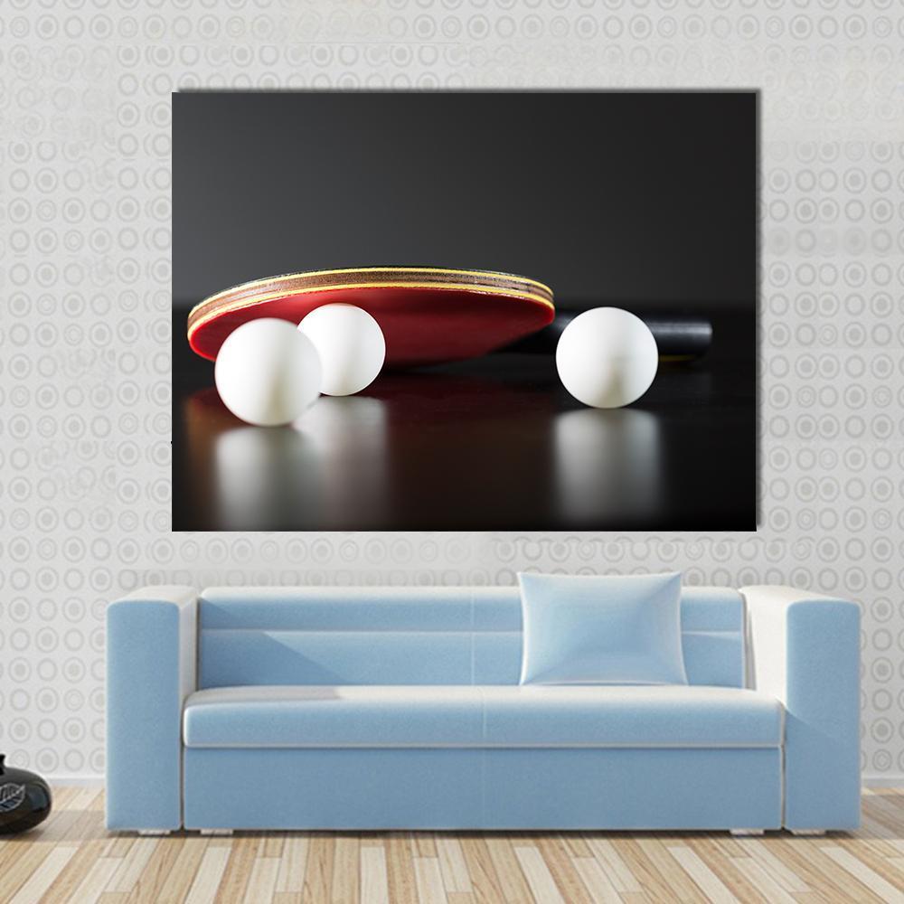 Table Tennis Racket and Balls Canvas Wall Art in black, white and red, 5 panel Star layout hung on a wall