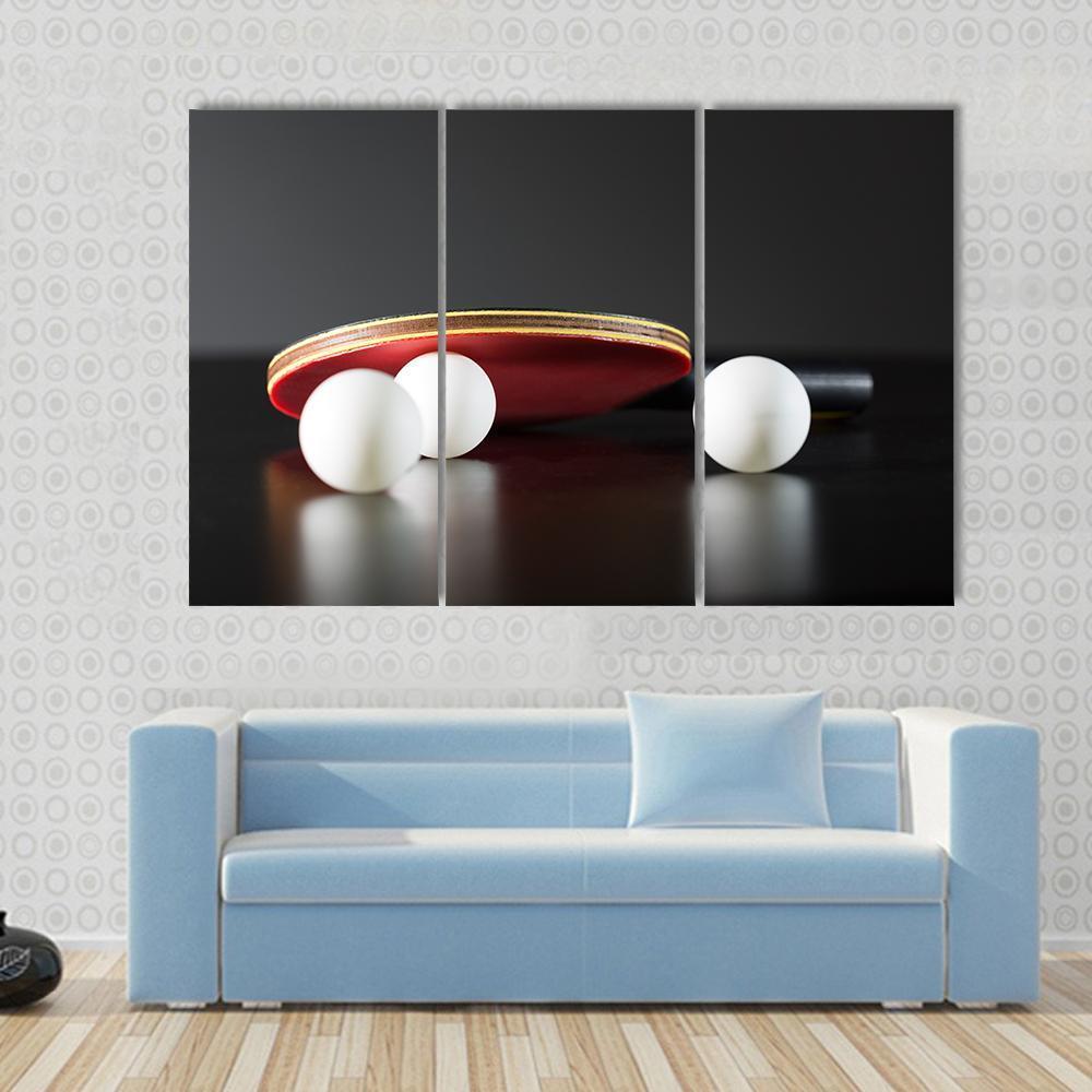 Table Tennis Racket and Balls Canvas Wall Art in black, white and red, 5 panel Star layout hung on a wall