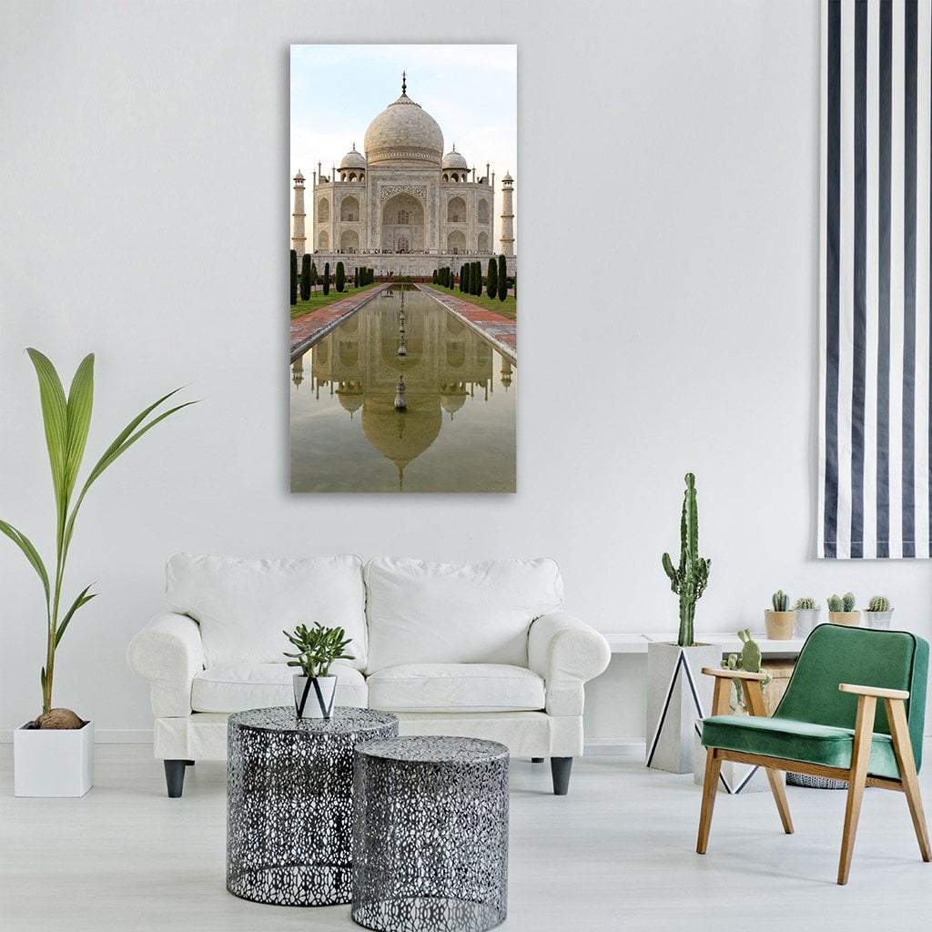Taj Mahal with Reflecting Pool in Agra Vertical Canvas Wall Art in white, gray and beige, single vertical panel hung on a wall