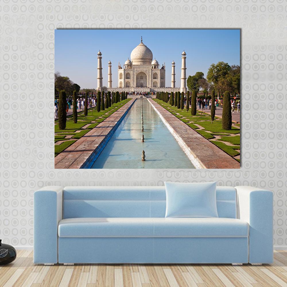 Taj Mahal Reflecting Pool and Gardens Canvas Wall Art in white, green and blue, single panel hung on a wall