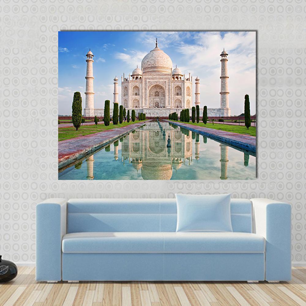 Taj Mahal in Sunrise Light Canvas Wall Art in white, beige and blue, single panel hung on a wall