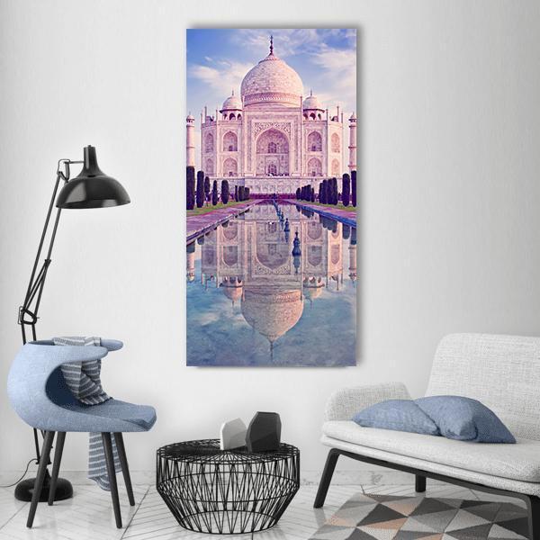 Taj Mahal in Agra Vertical Canvas Wall Art in white, blue and pink, single vertical panel hung on a wall