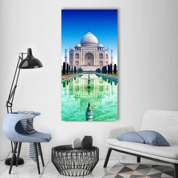 Taj Mahal Reflection in Water Vertical Canvas Wall Art in white, green and blue, single vertical panel hung on a wall