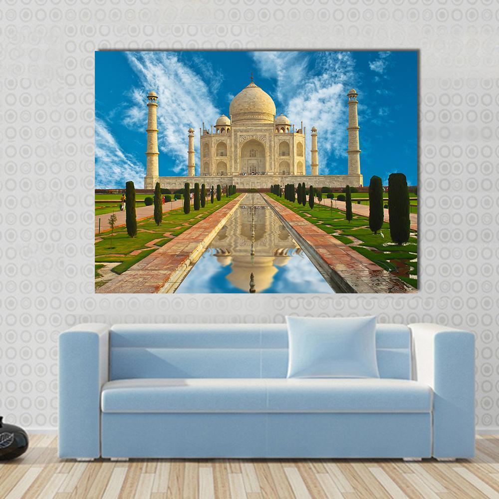 Taj Mahal Reflection in Water Canvas Wall Art in beige, green and blue, single panel hung on a wall