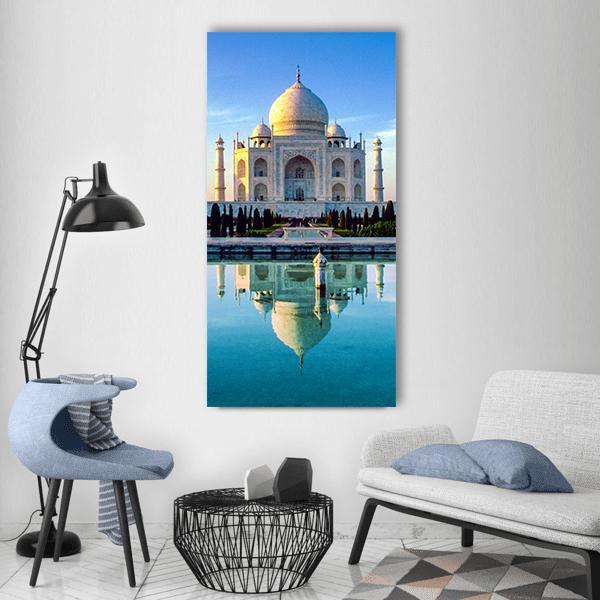 Taj Mahal Morning Reflection Vertical Canvas Wall Art in white, gold and blue, single vertical panel hung on a wall