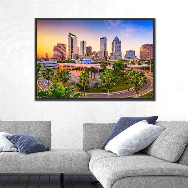 Tampa Downtown Skyline at Sunset Canvas Wall Art in orange, yellow and blue, framed canvas, product view on a white background