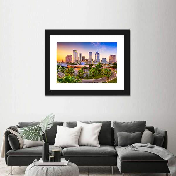 Tampa Downtown Skyline at Sunset Canvas Wall Art in orange, yellow and blue, framed print, product view on a white background