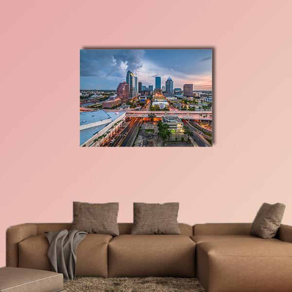 Tampa Bay Skyline at Dusk Canvas Wall Art in gray, orange and blue, single panel hung on a wall